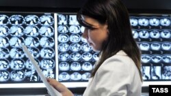 A physician examines X-rays at the N. N. Blokhin Cancer Research Center in Moscow. (file photo)