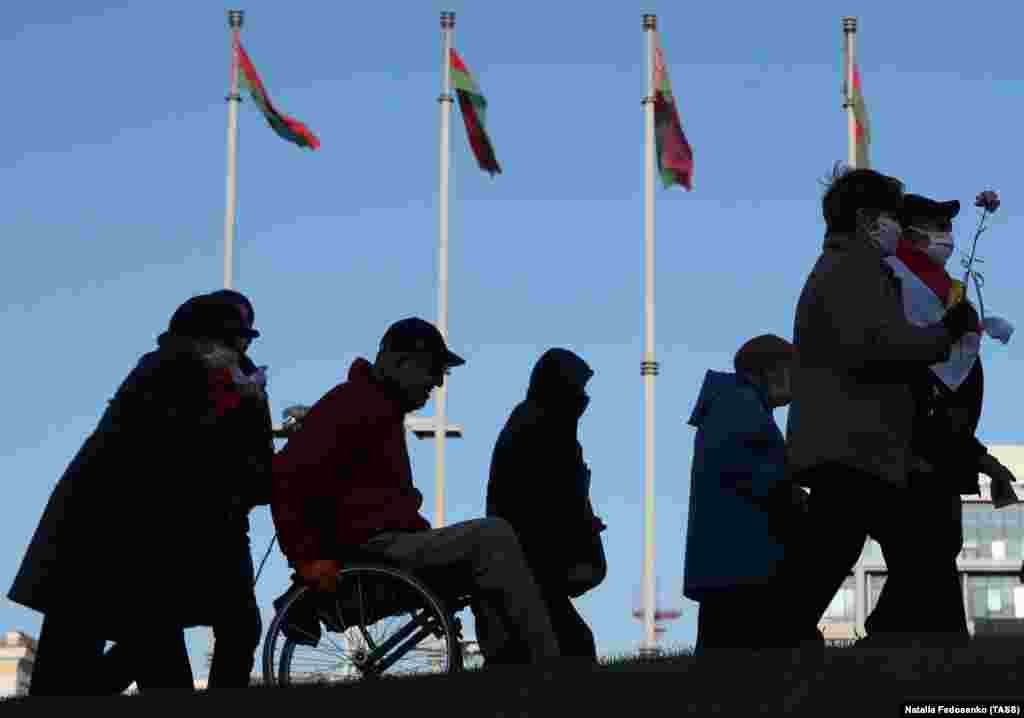 People take part in the &quot;March of People With Infinite Possibilities,&quot; an opposition event/rally held by disabled people, in Independence Square, Minsk, October 22, 2020.
