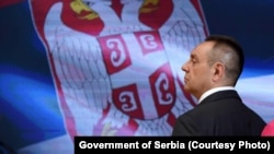 Ministar policije Srbije Aleksandar Vulin pored zastave Srbije, Beograd 29. juni 2021. 