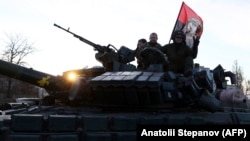 Украинские танкисты на дороге в Херсонской области, 14 ноября 2022 года