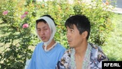 A Kyrgyz man and an ethnic Uzbek man recover in an Osh hospital from injuries sustained in the ethnic violence in June. They were smoking cigarettes and the Kyrgyz man made a point of calling the Uzbek man his "brother."