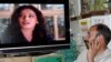 Afghan Minister Backs TV Head Scarves