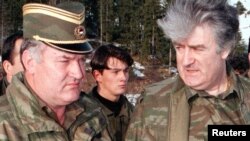 Former Bosnian Serb leader Radovan Karadzic (right) and his wartime commander Ratko Mladic