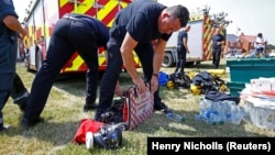 British personnel in Amesbury prepare tests at a site where two people were believed exposed to a nerve agent.