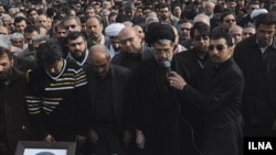 Mourners at the funeral of Masud Ali Mohammadi in Tehran on January 14