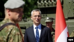 NATO Secretary-General Jens Stoltenberg attends an inauguration ceremony for a Canadian-led NATO battalion in Latvia.