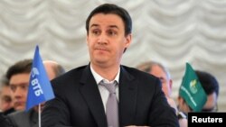 The jury praised Dmitry Patrushev for his bank's "contribution to the development of the domestic economy." The bank posted record preliminary losses of 67.9 billion rubles ($901 million currently) in the first three quarters of 2015.