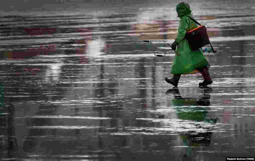 A fisherman walks on the frozen Volga River in the Ivanovo region of Russia. (TASS)