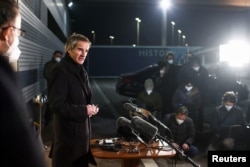 IAEA Director-General Rafael Grossi addresses the media upon his arrival from Tehran at Vienna International Airport on February 21.