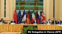 Delegation members from the parties to the Iran nuclear deal -- Germany, France, Britain, China, Russia and Iran -- attend a meeting at Vienna's Grand Hotel on May 1 as they try to restore the accord.