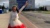 Screengrab from the Current Time video 'Flag Wars: Woman In White And Red Flees Belarus'.