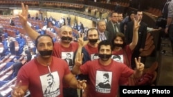 France -- Azerbaijani activists protest against Azerbaijani President Ilham Aliyev's speech at the Council of Europe's Parliamentary Assembly in Strasbourg on June 24.