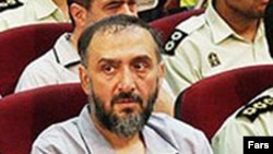 Mohammad Ali Abtahi sits in court during the first hearing in his trial in Tehran on August 1, 2009.