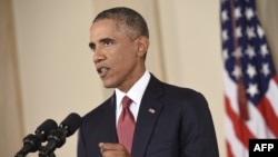 АКШ президенты Барак Обама ТВ мөрәҗәгате вакытында, 2014 елның 10 сентябре