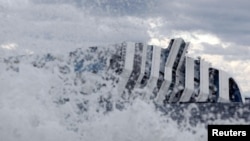 Шторм на месте крушения Costa Concordia, февраль 2012 г.