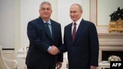 Hungarian Prime Minister Viktor Orban (left) meets with Russian President Vladimir Putin at the Kremlin in Moscow earlier this month. 