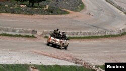 خودروی یکی از گروه‌های مسلح در نزدیکی سراقب؛ جمعه نهم اسفند