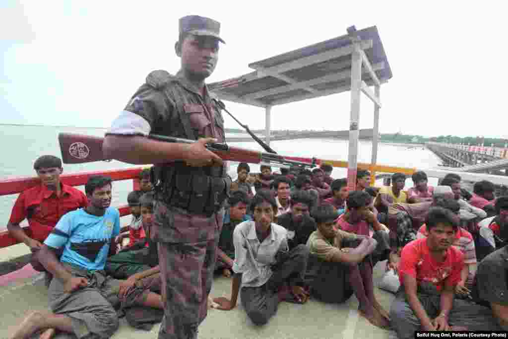 They were detained on a boat and watched over by the border guards.