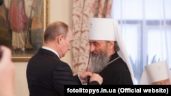 Путин и митрополит Онуфрий (2013 год)