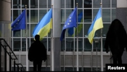 Ukrainian flags fly outside the EU Parliament building in Brussels. (file photo)
