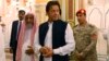Pakistani Prime Minister Imran Khan visits the Prophet's Mosque in Medina, Saudi Arabia, on September 18.