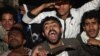 Yemeni anti-government protesters in Sanaa react after President Ali Abdullah Saleh signed a deal to transfer power. (AFP/Mohammed Huwais) &nbsp;<br />
