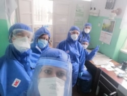 Ольга Кобевко з колегами, що залучені до боротьби з коронавірусом