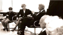 John Kruzel meets with U.S. President Bill Clinton shortly after the death of his father, diplomat Joseph Kruzel.