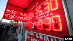 A sign displayed ruble exchange rates in central Moscow on January 30, when Russia's currency fell to a new low.