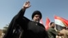 Iraqi Shi'ite cleric Moqtada al-Sadr appeared briefly at the demonstration in Baghdad. 