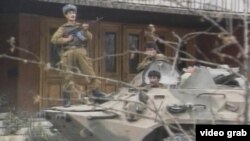 Tajik civil war - Fighters on a tank in Dushanbe