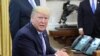 File - U.S. President Donald Trump speaks while participating in a border funding legislation signing ceremony in the Oval Office of the White House in Washington, U.S. July 1, 2019