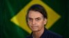 Žair Bolsonaro ispred brazilske zastave