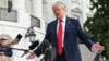 US President Donald Trump speaks to the media as he departs the White House on September 26.