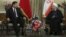 Iranian President Hassan Rohani (right) meets with Chinese President Xi Jinping in Tehran in January 2016.