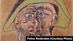 „Cap de arlechin”, tabloul distrus al lui Picasso, într-o fotografie dată publicității de poliție la Rotterdam