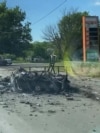 Знищені наземний роботизований комплекс (НРК) та позашляховик на в'їзді до Миколаївки, Донецька область, червень 2026 року