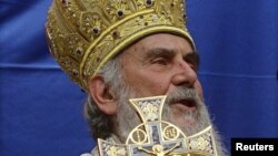 Kosovo -- Serbian Patriarch Irinej greets Serb faithful after being formally enthroned at the Patriarchate of Pec, 03Oct2010