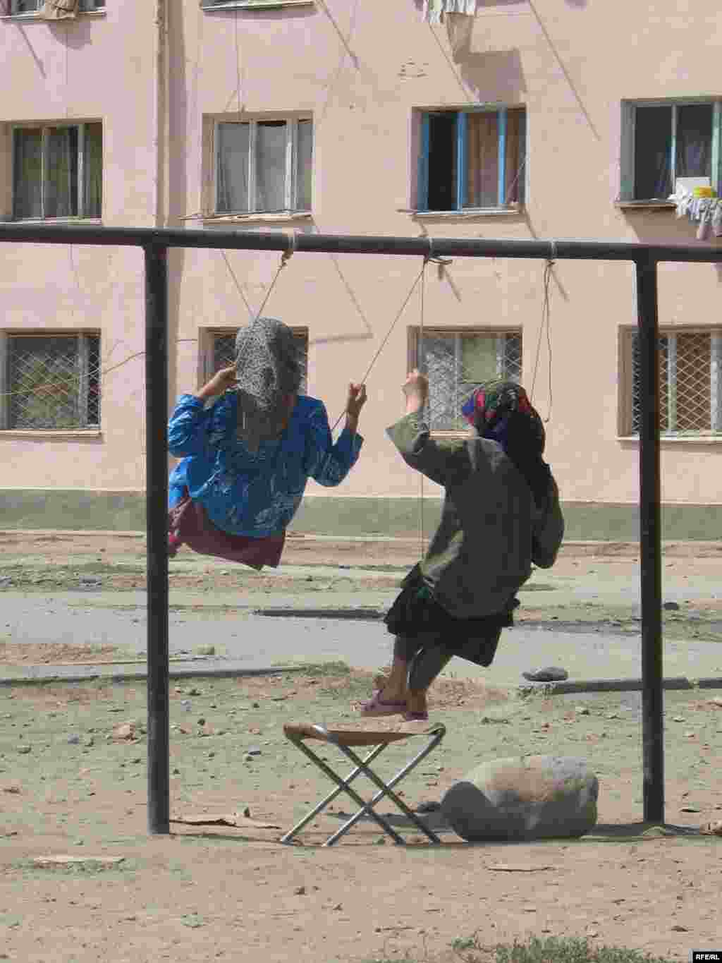 Playtime in a poor area of the capital, Dushanbe.