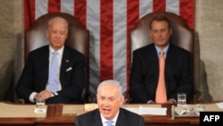 Israeli Prime Minister Binyamin Netanyahu addresses a joint session of the U.S. Congress with Vice President Joe Biden (left) and House Speaker John Boehner in the background.