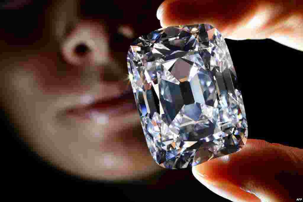 The 76-carat "Archduke Joseph" diamond was sold at auction in Geneva on November 13 for more than $21 million -- a world-record price per carat for a colorless diamond. Once part of the collection of Archduke Joseph of Austria (1872-1962), the diamond was mined at the legendary Indian Golkonda mine. (AFP/Fabrice Coffrini)