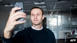 Russian opposition leader Aleksei Navalny shortly after being released being released from a detention center in Moscow on October 22. 