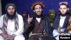 A video grab shows Omar Khalid Khorasani (C), the purported leader of Jamaat-ul-Ahrar (file photo).