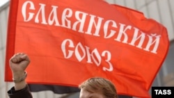 Ultra-nationalist leader Dmitry Dyomushkin chants slogans at a rally in May 2007.