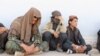 GRAB-Video Shows Islamic State Militants Who Surrendered In Afghanistan