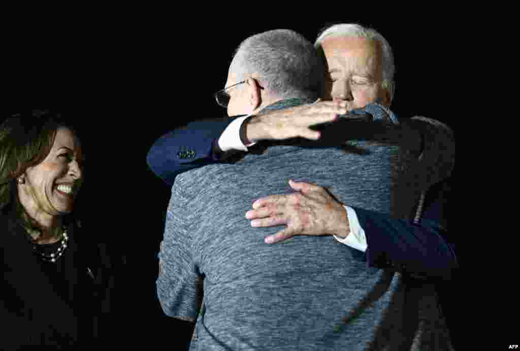 Harris smiles as Biden hugs Whelan as he arrived on August 1.&nbsp; Whelan, who also holds British, Canadian, and Irish citizenship, had been designated by the U.S. government as wrongfully detained.