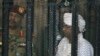 Omar al-Bašir u kavezu tokom suđenja, Kartum