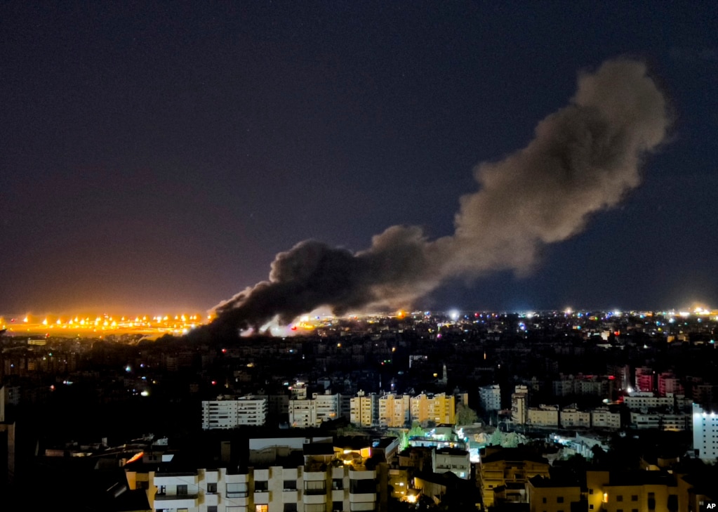 Smoke rises from an Israeli air strike that hit a southern suburb of Beirut on October 1.