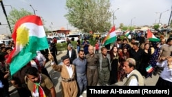 IRAQ -- Kurds celebrate during their independence referendum in Kirkuk, September 25, 2017