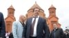 Armenia - Businessman Gagik Tsarukian is seen against the backdrop of the newly built Surp Hovannes church built by him in Abovian, 14May2013.